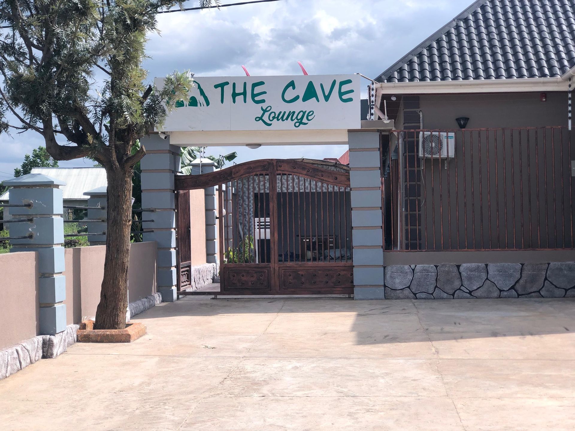 The Cave Lounge entrance and signage
